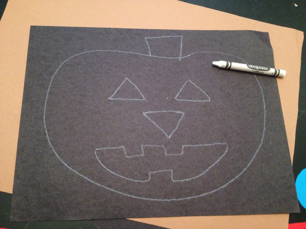 jack-o-lantern on black paper